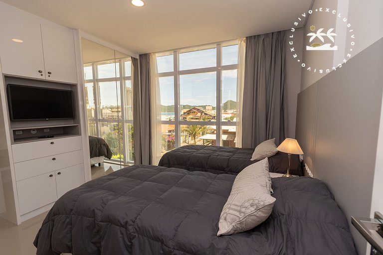 Costa Leste 203 - Apto com 2 suítes - 50 metros da Praia do