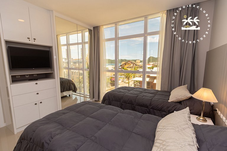 Costa Leste 203 - Apto com 2 suítes - 50 metros da Praia do