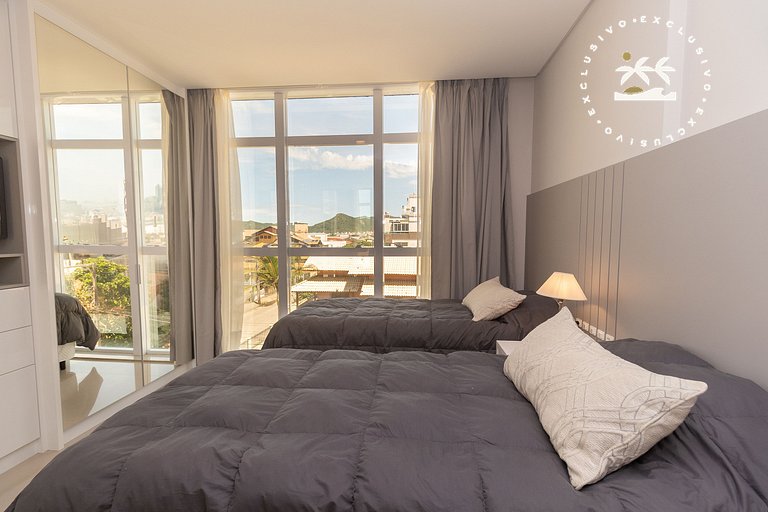 Costa Leste 203 - Apto com 2 suítes - 50 metros da Praia do